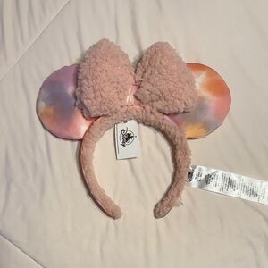 Disney Parks pink tie-dye and sherpa bow Minnie Ear Headband
